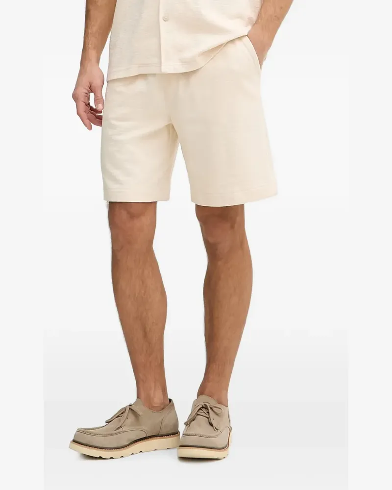 Guess logo-plaque shorts - Nude Nude