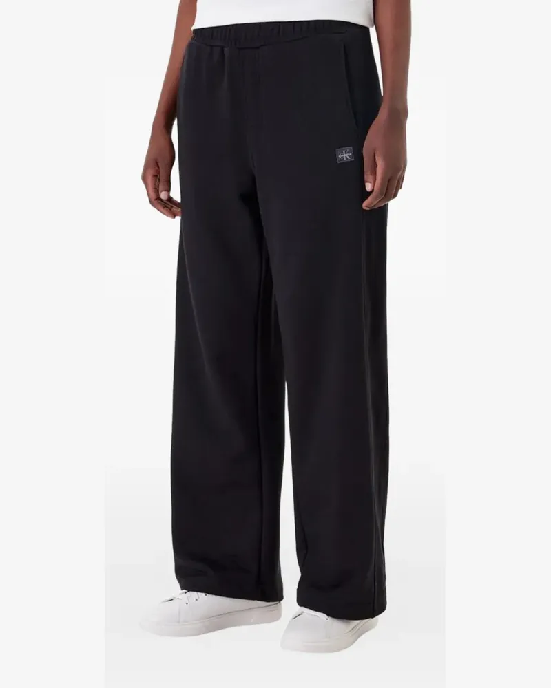 Calvin Klein logo-patch wide-leg track pants - Schwarz Schwarz