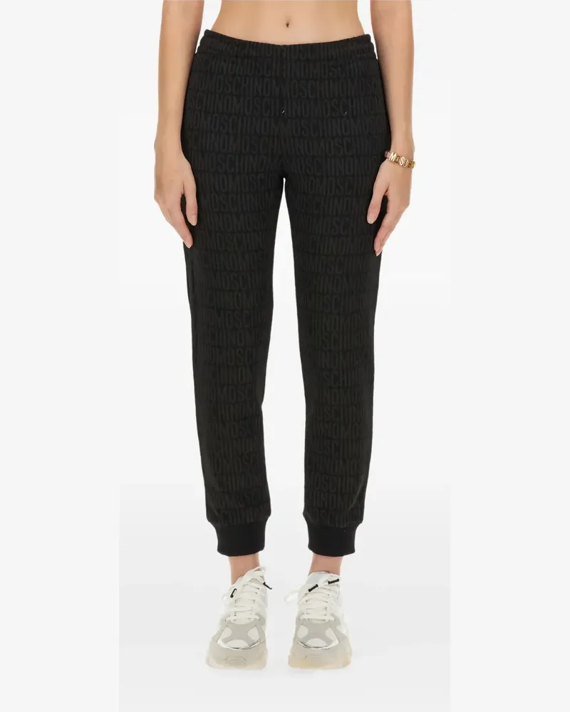 Moschino monogram-print track pants - Schwarz Schwarz