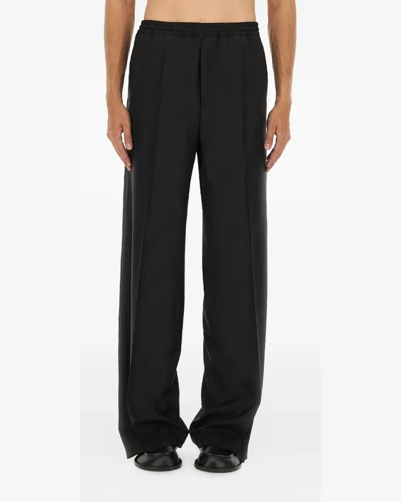 Moschino button-embellishment trousers - Schwarz Schwarz