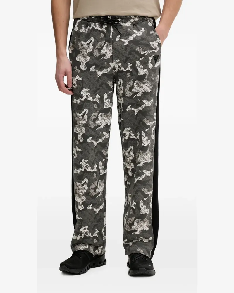 Guess logo-print camouflage-pattern track pants - Grau Grau