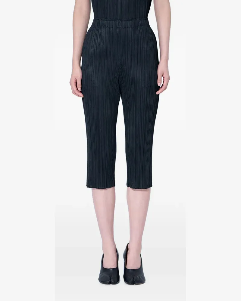 Issey Miyake pleated cropped trousers - Schwarz Schwarz