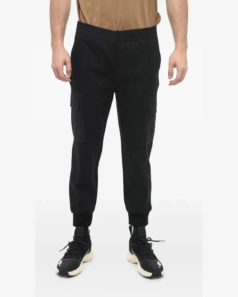 Neil Barrett low-rise skinny-fit tapered trousers - Schwarz Schwarz