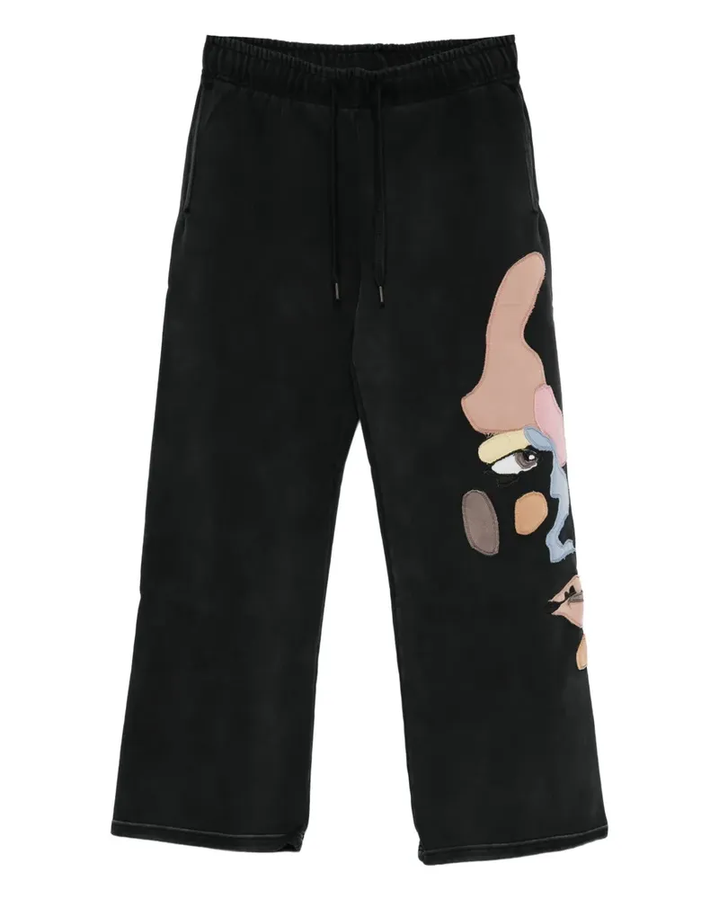 KidSuper motif-appliqué trousers - Schwarz Schwarz