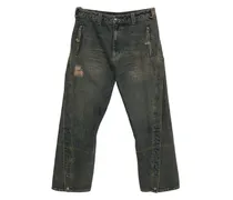 Jeans mit verdrehten Taschen - Blau