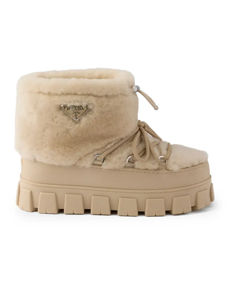 Prada Après-Ski-Stiefel aus Shearling - Nude Nude