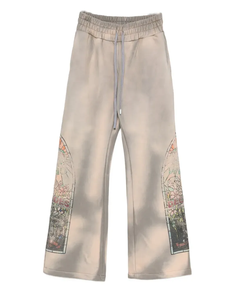 WHO DECIDES WAR graphic-print track pants - Nude Nude