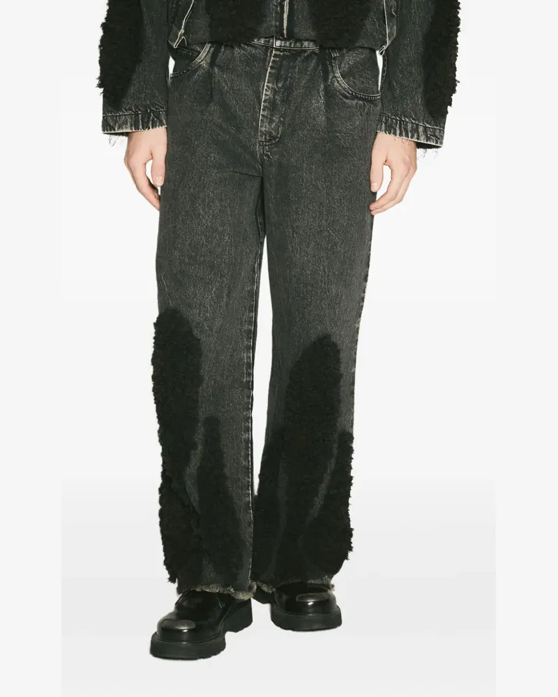 Song For The Mute Ausgefranste Jeans mit Shearling-Einsatz - Schwarz Schwarz