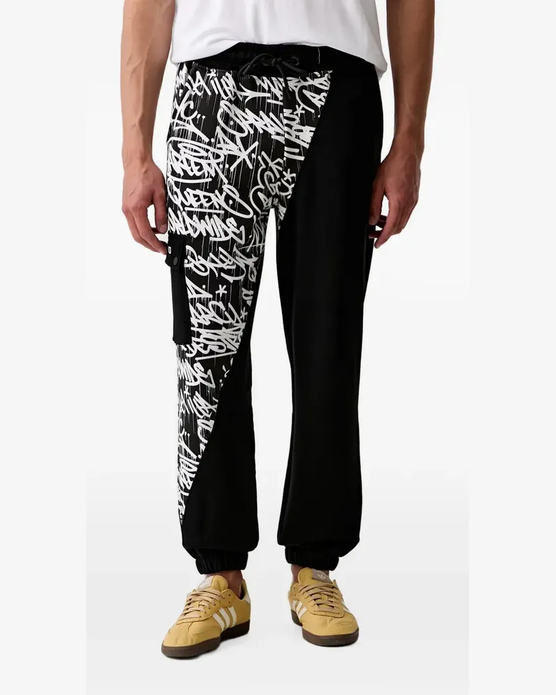 Sprayground graffiti-print cargo-pocket track pants - Schwarz Schwarz