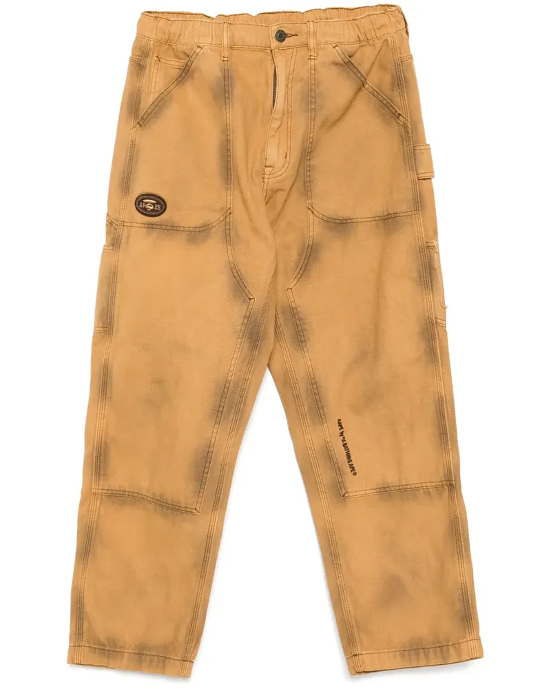 BAPE Ausgeblichene Jeans mit Moonface-Logo - Braun Braun