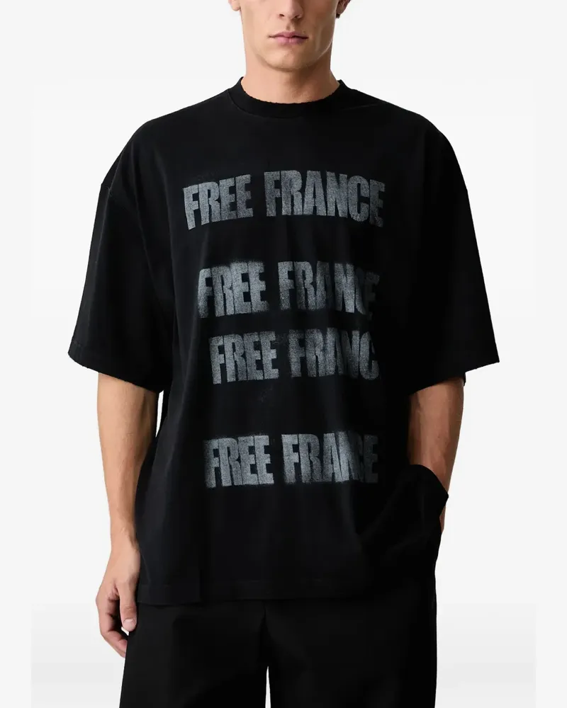 VETEMENTS slogan-print T-shirt - Schwarz Schwarz