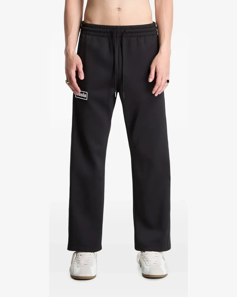PLEASURES logo-patch drawstring track pants - Schwarz Schwarz