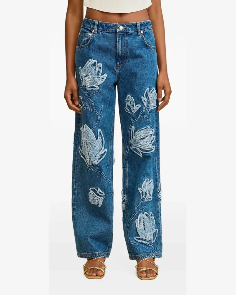 Cult Gaia Ausgefranste Jeans mit Blumenapplikation - Blau Blau