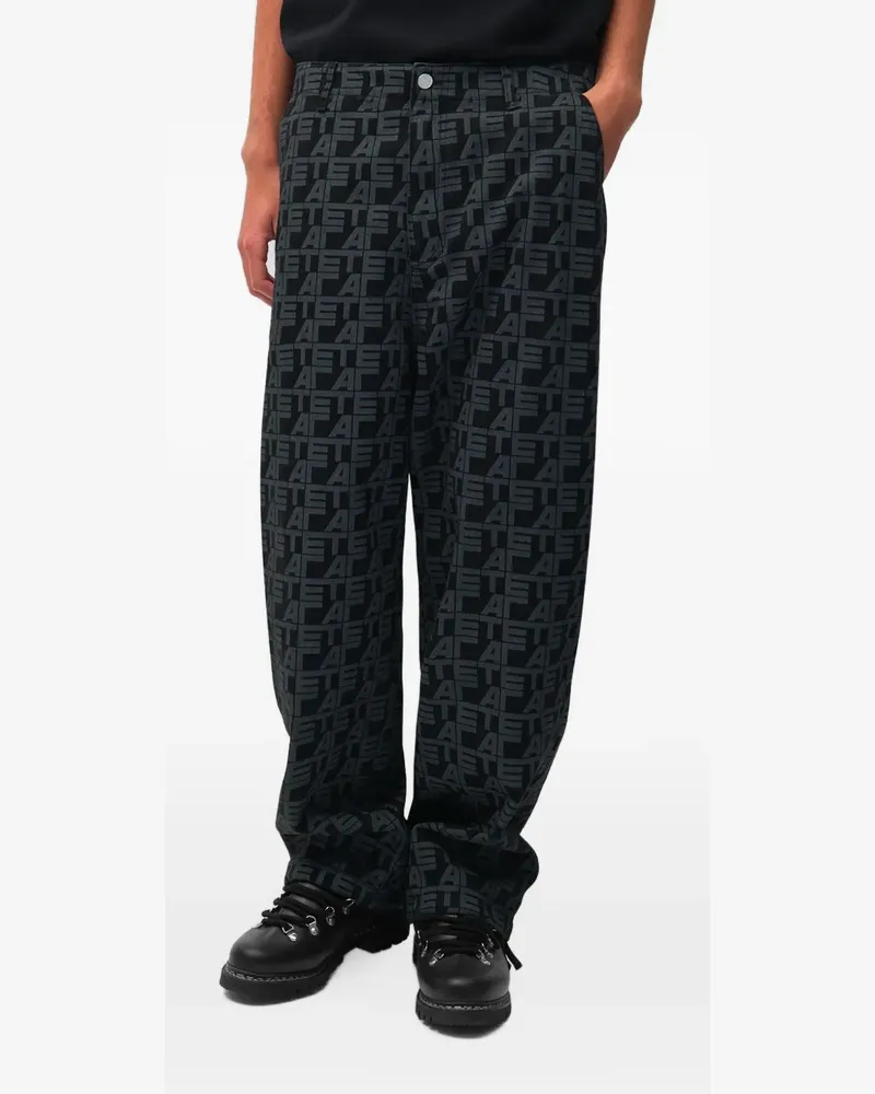 Arte Antwerp Jeans mit Monogramm-Print - Schwarz Schwarz