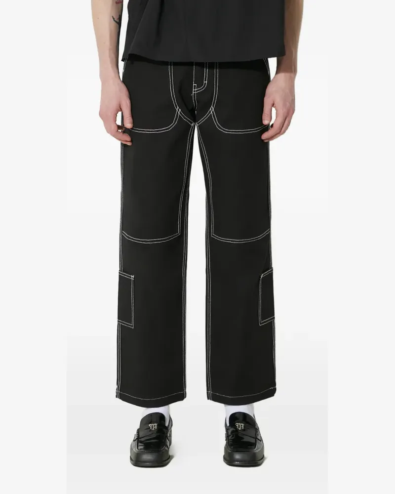 PLEASURES logo-patch trousers - Schwarz Schwarz