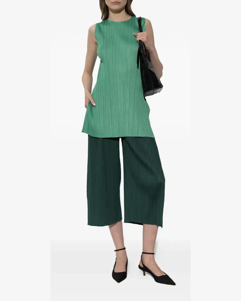 Issey Miyake plissé-effect trousers - Grün Grün
