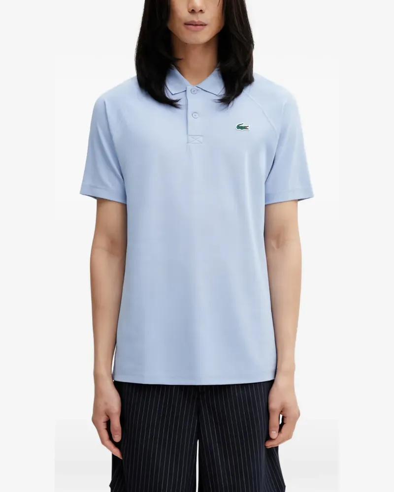 Lacoste logo-patch raglan-sleeve polo shirt - Blau Blau