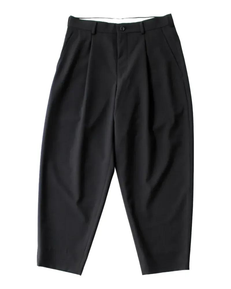 Comme des Garçons pleated tapered-leg trousers - Schwarz Schwarz