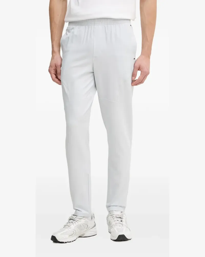 Under Armour UA Unstoppable logo-patch elasticated-waistband trousers - Grau Grau