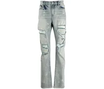 Schmale Distressed-Jeans