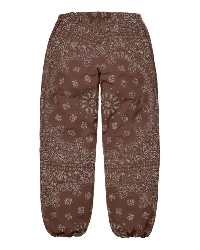 Supreme Being bandana-print track pants - Braun Braun