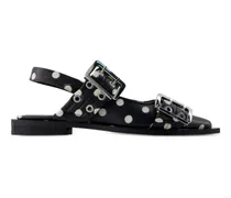 Flache Pumps mit Polka Dots - Schwarz