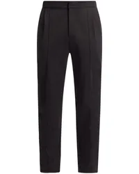 Michael Kors pressed-crease tapered trousers Schwarz