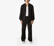 Jogginghose mit Web-Print - Schwarz