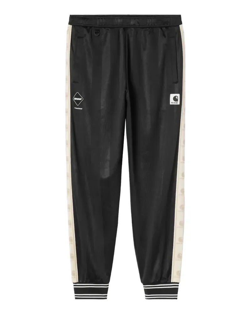 Carhartt WIP logo-stripe ribbed-cuff track pants - Schwarz Schwarz
