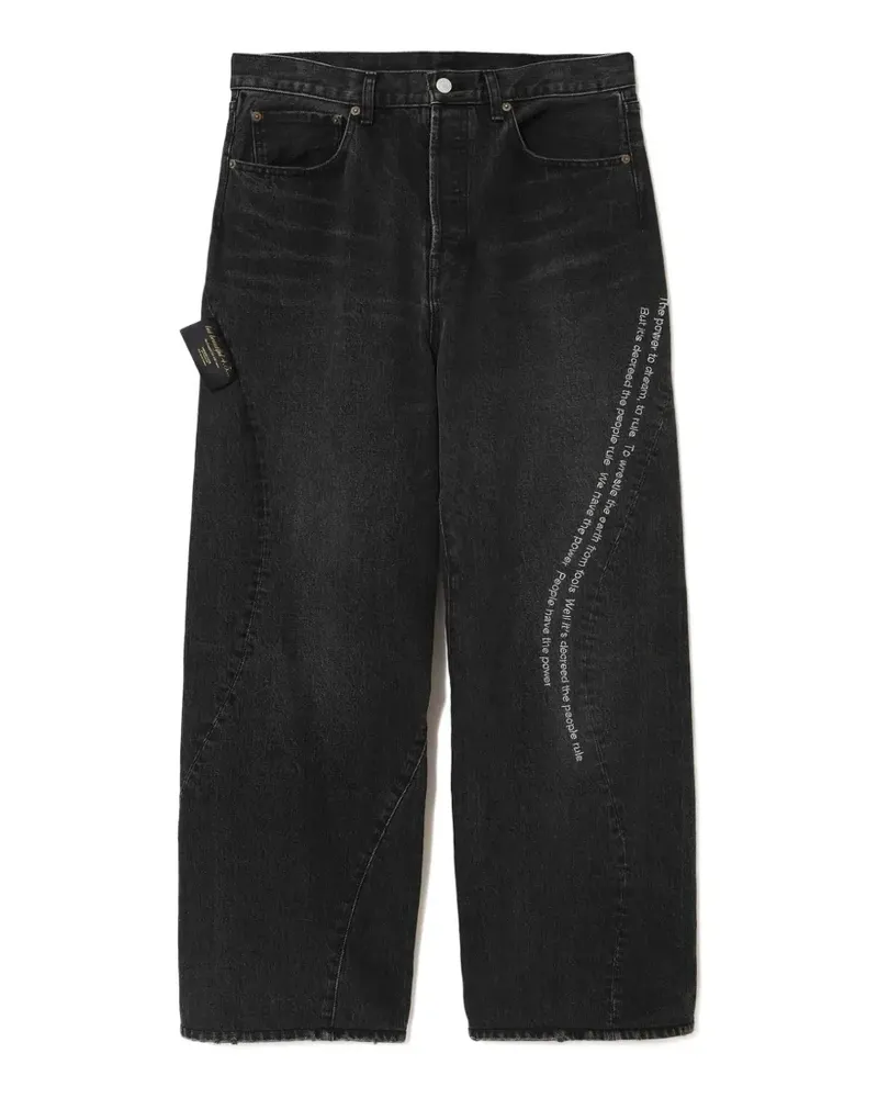 Undercover slogan-print panelled jeans - Schwarz Schwarz