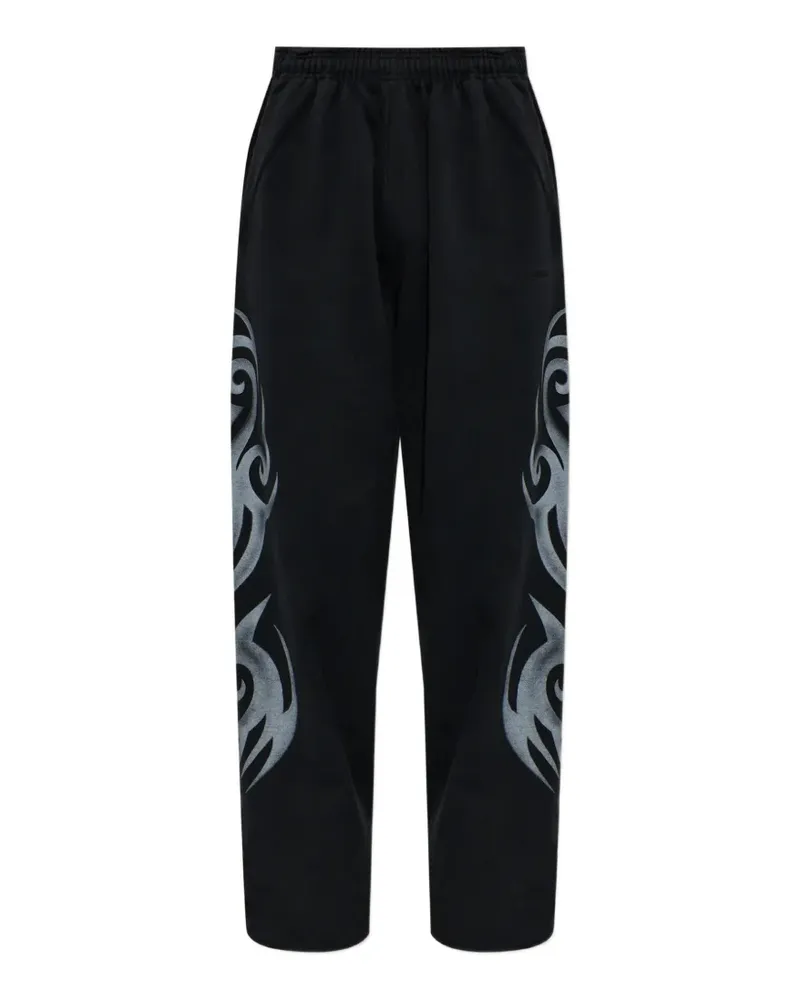 VETEMENTS tribal-print track pants - Schwarz Schwarz