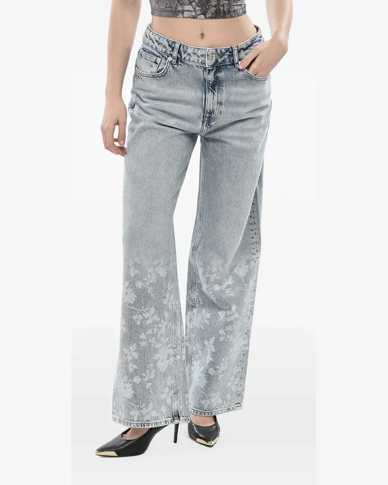 Holzweiler floral-print jeans - Blau Blau