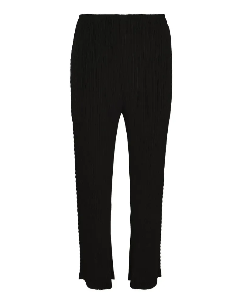 Issey Miyake plissé-effect trousers - Schwarz Schwarz