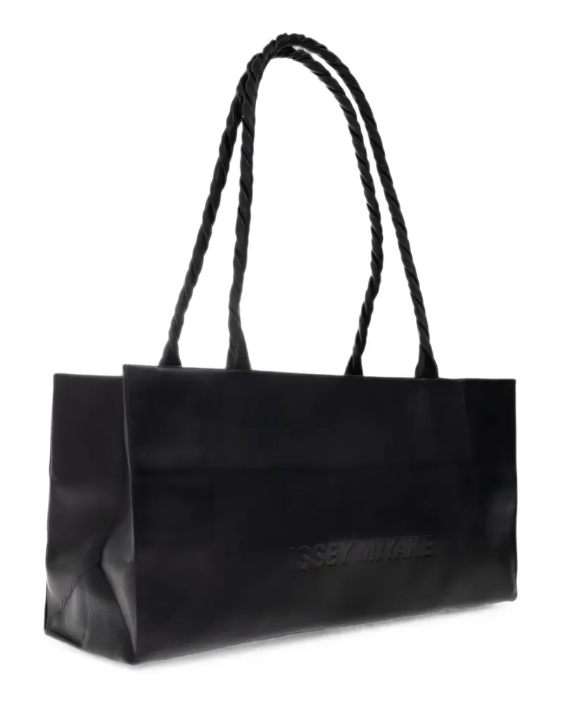Issey Miyake logo-debossed twisted-handle shoulder bag - Schwarz Schwarz