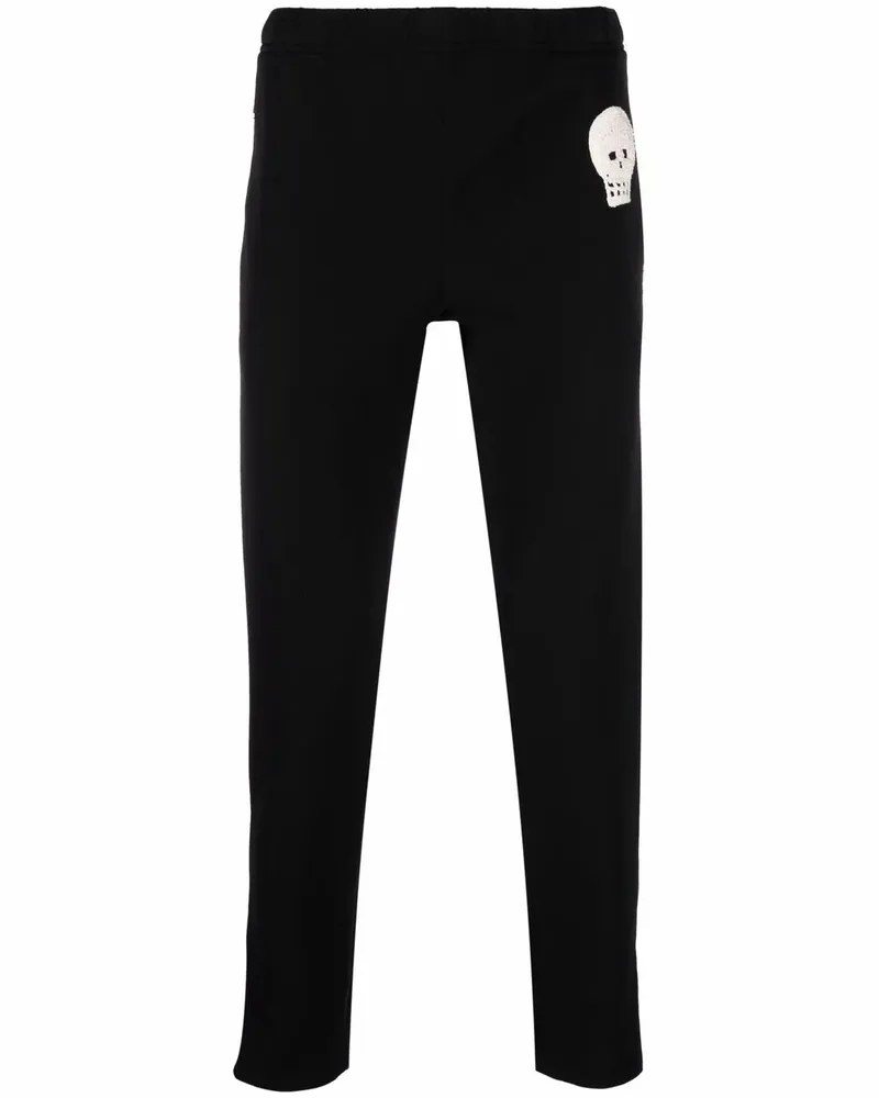 Alexander McQueen Schmale Jogginghose mit Totenkopf-Patch - Schwarz Schwarz