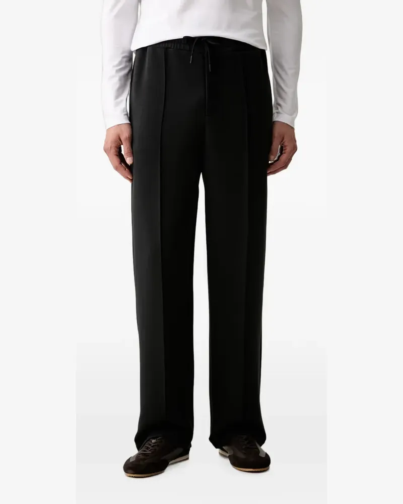 Guess logo-patch drawstring track pants - Schwarz Schwarz