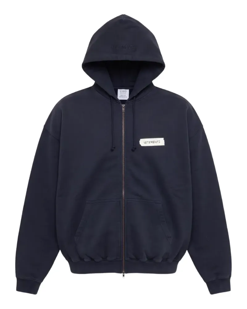VETEMENTS logo-patch zip-up hoodie - Schwarz Schwarz