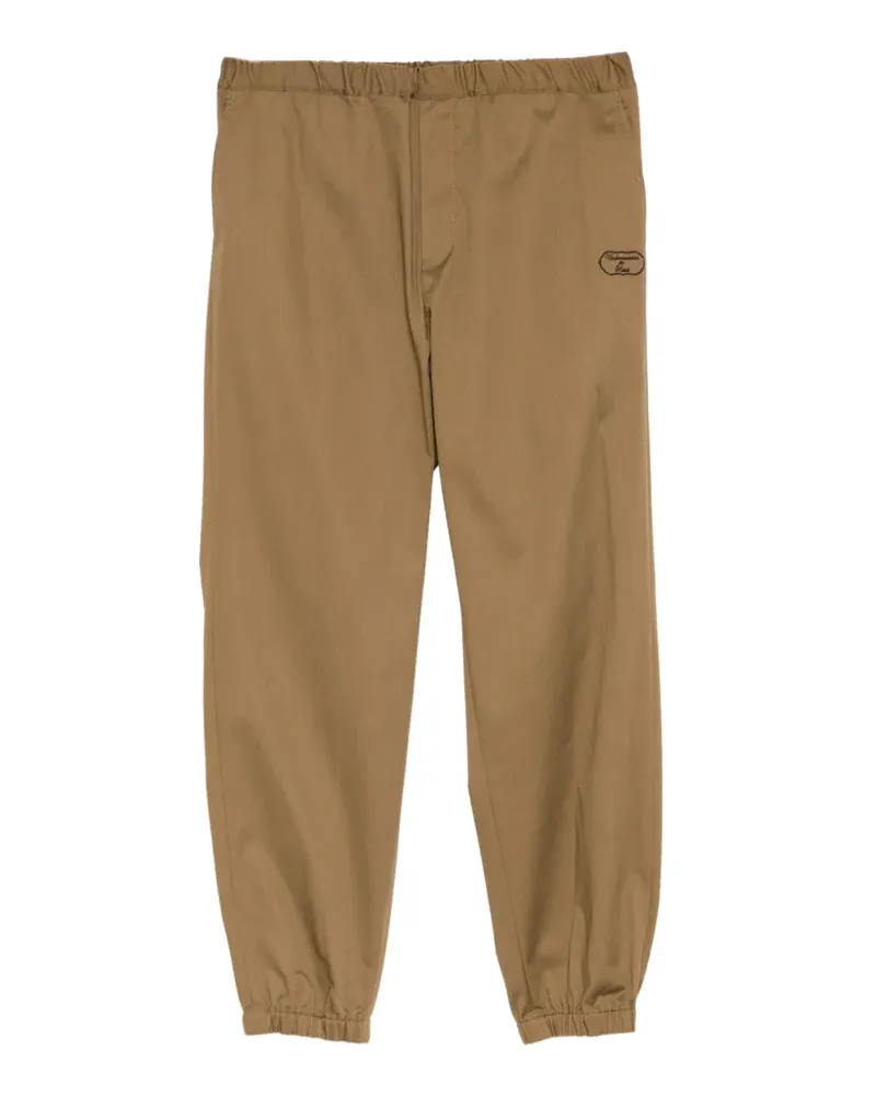 Undercover logo-embroideried track pants - Nude Nude
