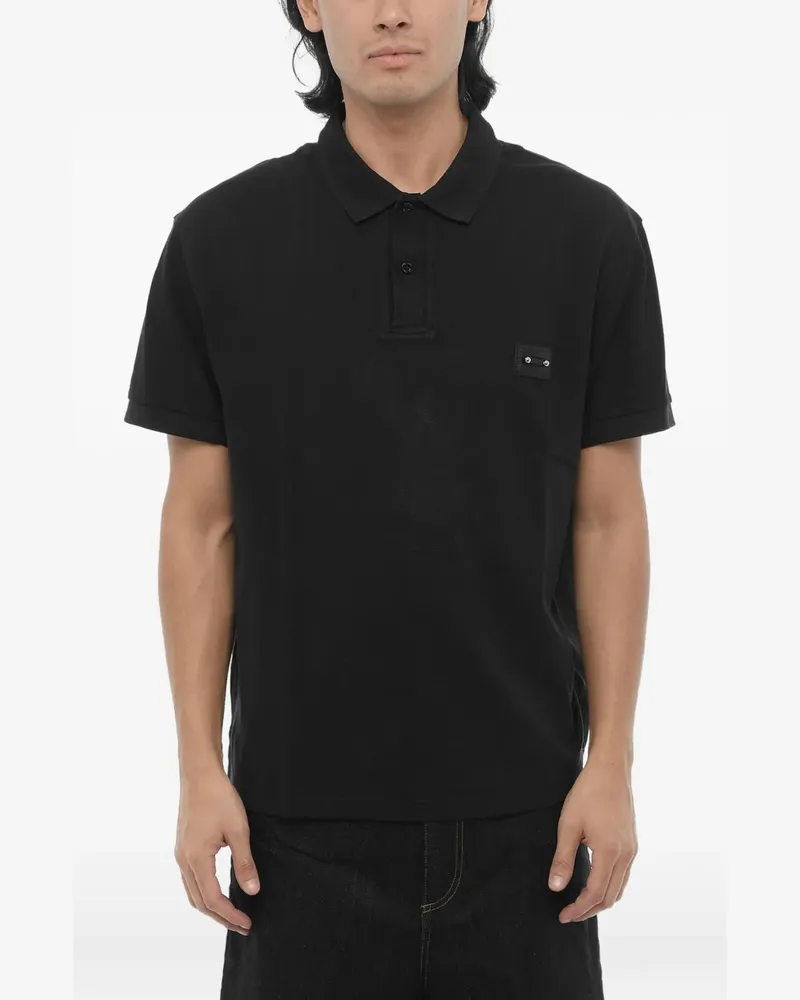 Neil Barrett piercing-detail polo shirt - Schwarz Schwarz