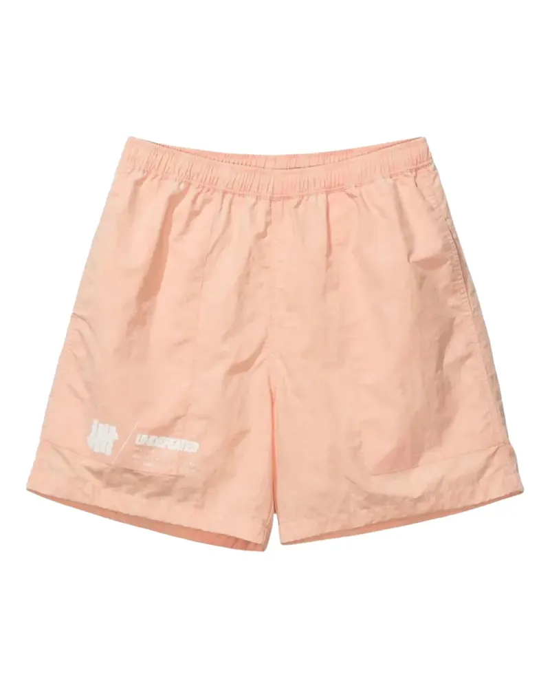 Undefeated Shorts mit Batikmuster - Orange Orange