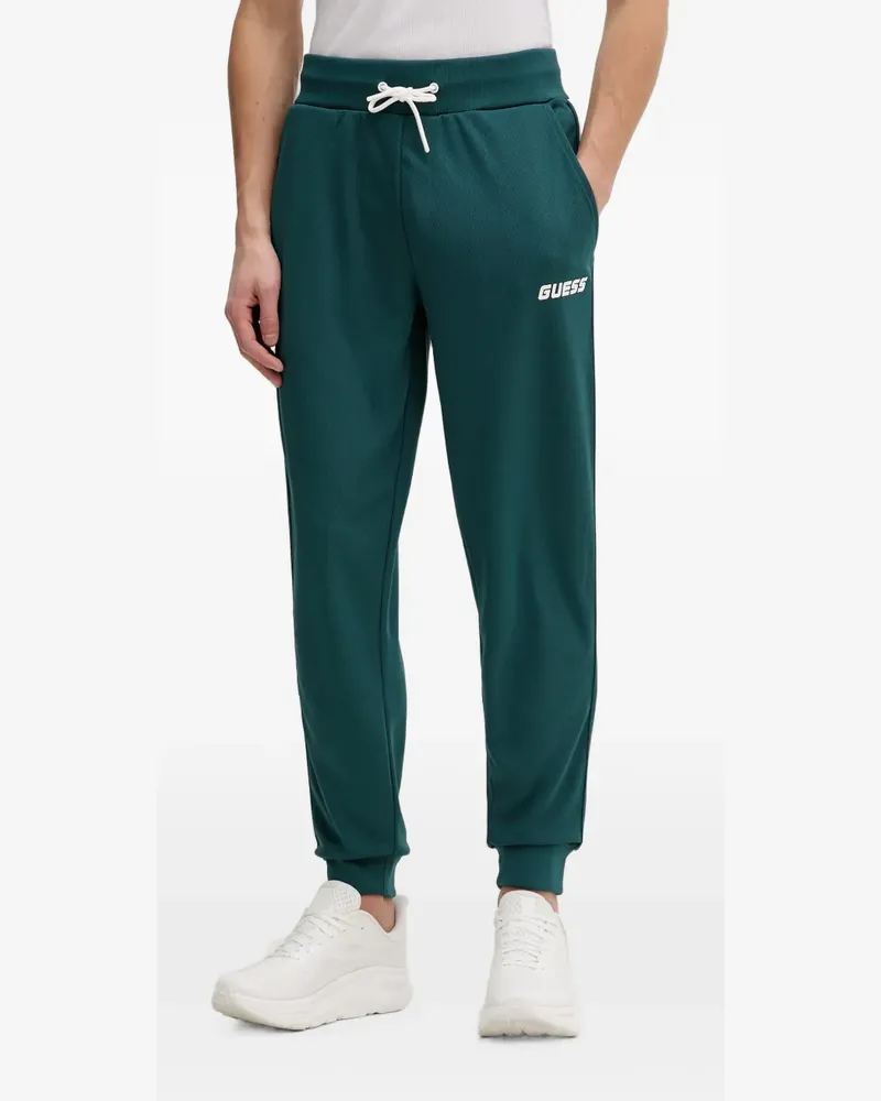 Guess logo-print side-stripe track pants - Grün Grün
