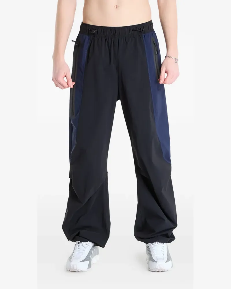 Nike Dri-FIT colourblock woven track pants - Schwarz Schwarz