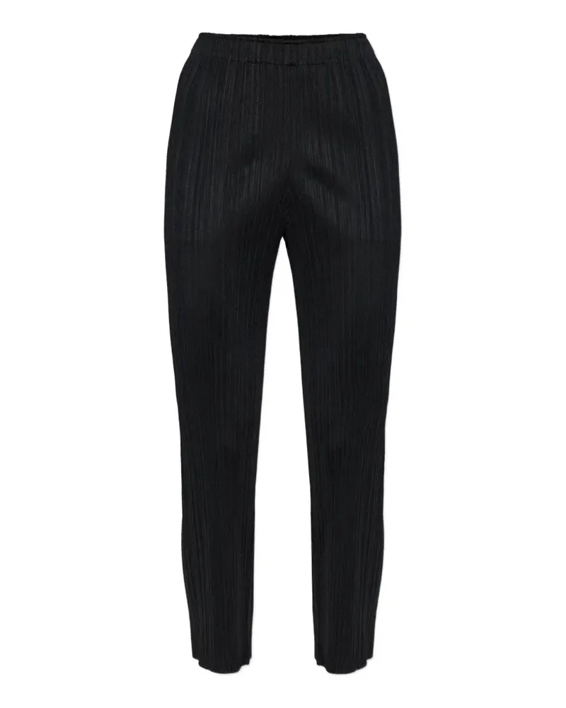 Issey Miyake plissé-effect trousers - Schwarz Schwarz