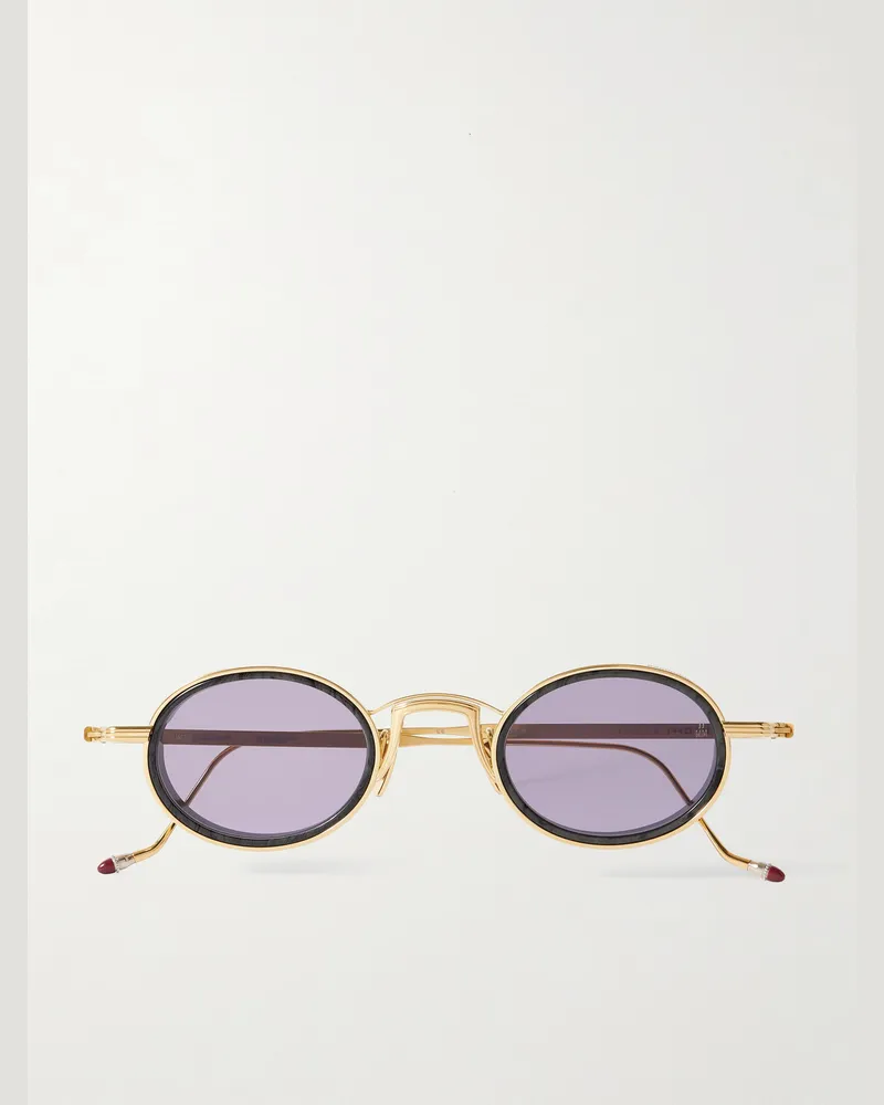Jacques Marie Mage Varda goldfarbene Sonnenbrille mit ovalem Rahmen und Details aus Azetat Braun