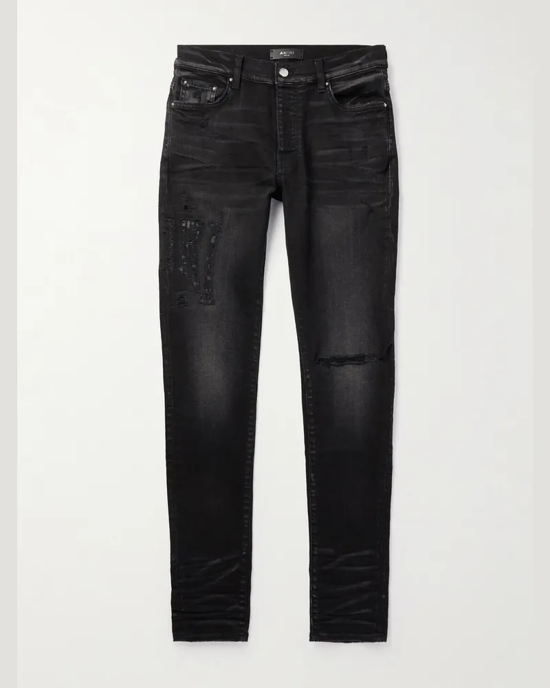 Amiri Skinny Jeans in Distressed-Optik Schwarz