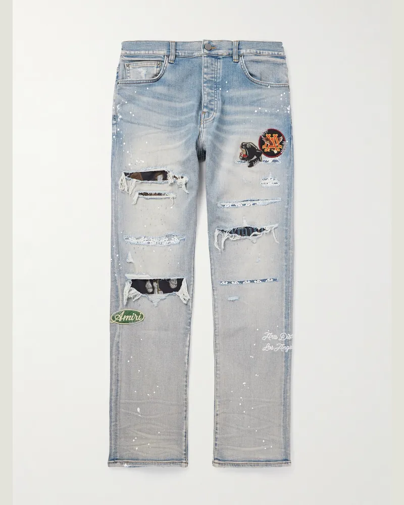 Amiri Skinny Jeans mit Applikationen und Farbspritzern in Distressed-Optik Blau