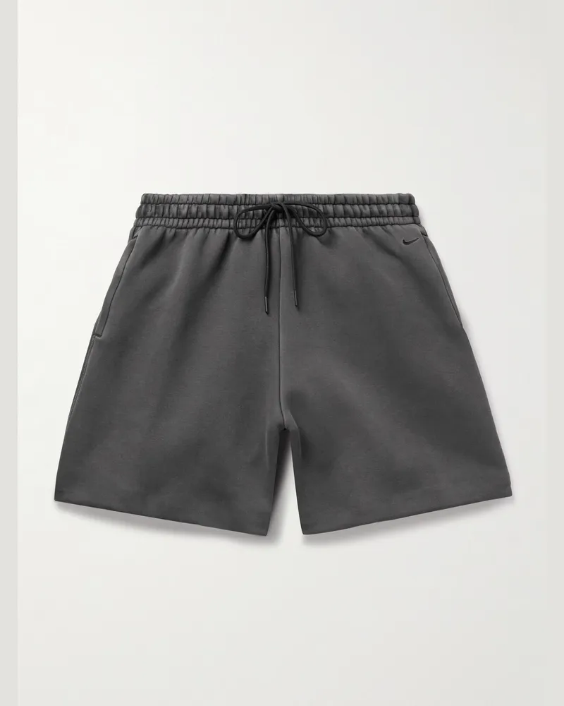 Nike Weit geschnittene Shorts aus„Tech Fleece“-Material mit Kordelzugbund in Stückfärbung Schwarz