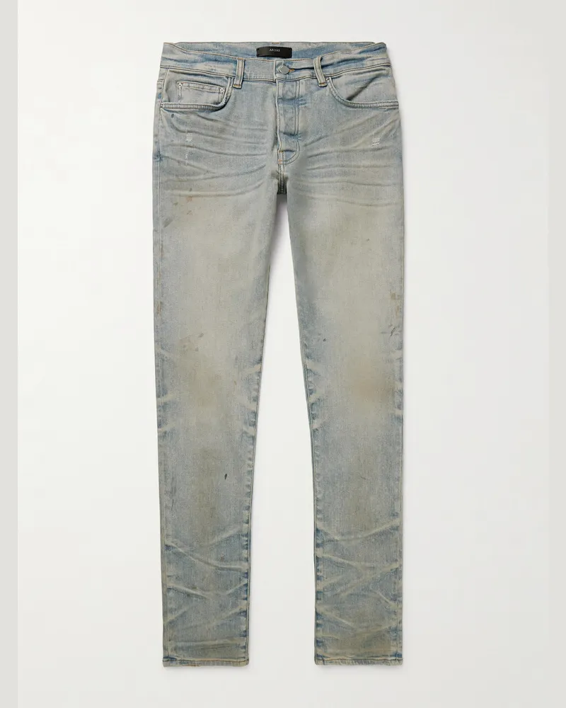 Amiri Stack Skinny Jeans in Distressed-Optik Blau