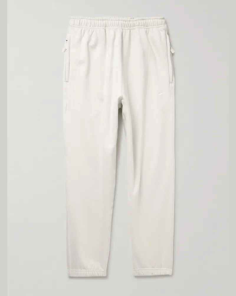 Nike Solo Swoosh schmal zulaufende Jogginghose aus Jersey aus einer Baumwollmischung mit Logostickerei Neutral