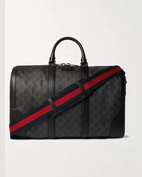 Gucci Reisetasche aus beschichtetem Canvas mit Logomuster und Lederbesatz Schwarz